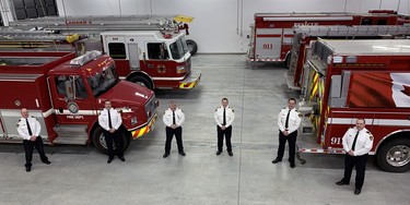 There's so much space in the new West Perth fire station, captain Rob Lealess (left), captain Mike Montgomery, station chief Jim Tubb, deputy station chief Ken Monden, captain Rick Cook and captain Cody Feltz can safely distance themselves. ANDY BADER