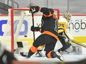 Philadelphia Flyers right wing Travis Konecny scores on Pittsburgh Penguins goaltender Tristan Jarry in the first period of a 5-2 Flyers win Friday in Philadelphia. Konecny scored his first NHL hat trick Friday. (Eric Hartline-USA TODAY Sports)