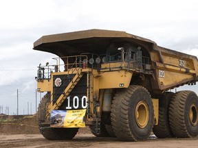 17-100, a Caterpillar 797 at Syncrude's Aurora site, pictured after hitting 100,000 operating hours. In December, it recorded 150,000 operating hours, despite being designed for 72,000 operating hours. Supplied Image/Syncrude Canada