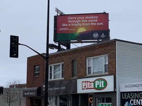 A billboard at Division and Princess streets featuring a poem by the city's poet laureate, Jason Heroux, is the first installation of the city's public art project in the Hub district.