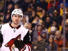 Kyle Capobianco (75) of the Arizona Coyotes looks on during the third period of his first NHL game at TD Garden on December 7, 2017 in Boston, Massachusetts.