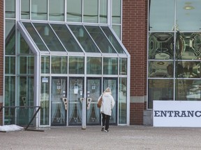 A person enters Western Fair Agriplex. (Derek Ruttan/The London Free Press)