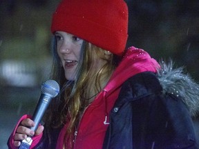 Thirteen year old Phoenix Scott speaks to a crowd of 27 people during a protest she organized with her mother Julie Corneman in Woodstock, Ont. on Thursday January 21, 2021. (Derek Ruttan/The London Free Press)