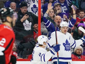 Maple Leafs' Auston Matthews celebrates a goal with teammate Zach Hyman during a game against the Ottawa Senators at Canadian Tire Centre in Ottawa in February.