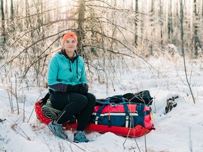 Jessica Leska prepares to run to Fort Chipewyan in March. Photo by Thomas Hopkins Photography