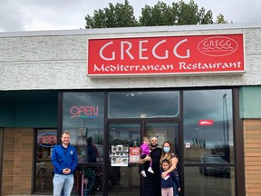 Sherwood Park MLA Jordan Walker visiting local restaurant Gregg Mediterranean in 2020.