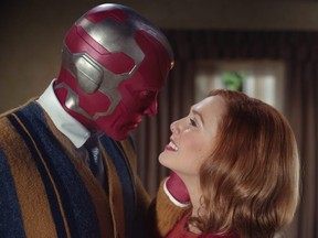 Paul Bettany as Vision and Elizabeth Olsen as Wanda Maximoff in Marvel Studios' WandaVision.