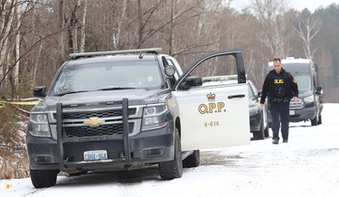 Ontario Provincial Police officers investigate the discovery of a body off of Tilton Lake Road in Eden Township on Wednesday December 9, 2020. Police are treating the death of Amanda Oake, 40, of Valley East as suspicious. John Lappa/Sudbury Star/Postmedia Network