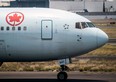 An Air Canada plane prepares to take off at the Benito Juarez International airport, in Mexico City, amid the COVID-19 pandemic, May 20, 2020.