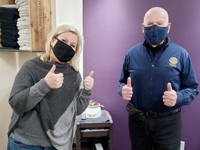 Pictured here on Nov. 26, 2020 is Laurie Osborne, Community Coordinator at Heart of Hastings Hospice alongside Darcy McGroarty who has just shaved his head to honour a pledge to the many sponsors who generously donated to his ÒLocks For LoveÓ campaign that raised $3,020 in support of the hospiceÕs day-to-day programs and services. TERRY VOLLUM PHOTO