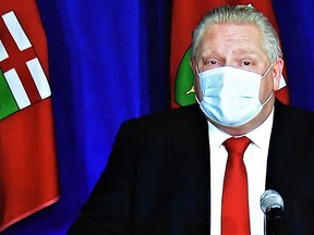Premier Doug Ford told reporters Thursday he has concerns about a potential 500,000 fewer Pfizer vaccines being made available to Ontario for its ongoing immunization program. POSTMEDIA FILE