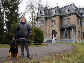 Newly-retired curator Rona Rustige leaves Glanmore National Historic Site Thursday, the final day of her 30-year career at the Belleville museum. She was joined by Bud, her nine-year-old Doberman pinscher.
