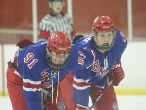 South Grenville's Cole Edgley (left) and Hunter Shipclark get set for a faceoff in the Rangers' end during a 4-0 win at home against the Bytown Royals on Feb. 1, 2020. 
File photo/The Recorder and Times