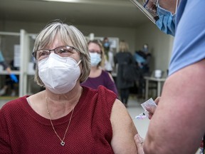 Catherine Webster, a personal support worker at Carveth Care Centre in Gananoque, get the COVID-19 vaccine at the Kingston Health Sciences Centre on Thursday. (SUBMITTED PHOTO)