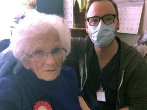 Mary Scott, who just celebrated her 105th birthday, gets her COVID-19 vaccine at Almonte Country Haven. Scott, the former owner of the Pakenham General Store, was immunized by Matt Stewart, an RN on staff at the Haven. Photo courtesy of Almonte Country Haven