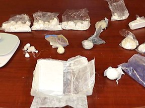 Chatham-Kent police provided this photo of suspected cocaine and fentanyl seized from two residences in Chatham on Wednesday night.