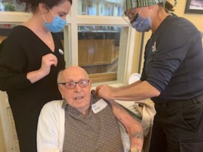 At age 100, Huronview Home for the Aged resident Alan Neals received his first dose of the Pfizer BioNTech COVID-19 vaccine. Handout