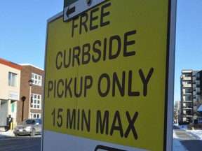 A curbside pickup sign posted in one of the City of Cornwall's paid curbside parking spots. Photo taken on Friday January 8, 2021 in Cornwall, Ont. Francis Racine/Cornwall Standard-Freeholder/Postmedia Network