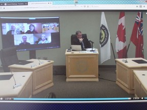 South Stormont Mayor Bryan McGillis in council chambers, and councillors on screen, at a meeting on Wednesday, January 13, 2021, in Long Sault, Ont. Todd Hambleton/Cornwall Standard-Freeholder/Postmedia Network