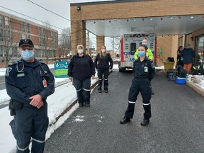 Handout/Cornwall Standard-Freeholder/Postmedia Network
Cornwall-SDG Paramedics seen outside of the Parisien Manor long-term care centre in Cornwall, one of several sites where the Eastern Ontario Health Unit, with the paramedics, began immunizing residents and staff members on Wednesday, Jan. 13, 2021.

Handout Not For Resale