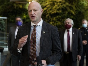 Wood Buffalo Mayor Don Scott speaks to the media following a meeting with Minister of Health Tyler Shandro about Alberta Health Services' plans to consolidate EMS Dispatch, in Edmonton Thursday Sept. 24, 2020. The meeting was also attended by the mayors of Calgary, Lethbridge, and Red Deer. Photo by David Bloom