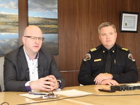 Mayor Don Scott sits with Regional Fire Chief Jody But during a press conference at the Jubilee Centre in Fort McMurray, Alta. On May 3, 2018. Vincent McDermott/Fort McMurray Today/Postmedia Network