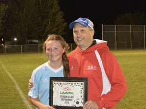 Coach Ray Lewis with daughter Bryn after winning the LAWSL cup championship in 2015. Lewis was recently honoured by receiving an induction into the LAWSL 2021 Hall of Fame for years of dedication to women's soccer.  Submitted