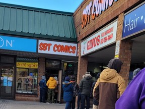 People lined up outside SBT Comics to offer words of comfort and support after the popular west-end Kingston game shop was broken into on New Year's Eve.