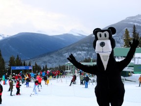 Jasper the Bear, created by artist and cartoonist James Simpkins in 1948, remains popular with the public as he mugs for the camera on Nov 14, 2015, the opening day of skiing for the 2015-16 ski season at Marmot Basin, located in Jasper National Park.