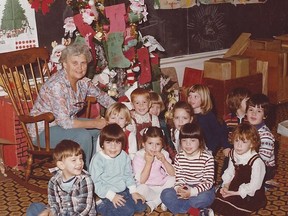Mary Halligan with children from one of the many kindergarten classes she taught during a 15-year stint at St. Paul's Catholic School.
