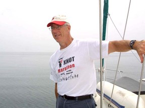 John Munro prior to his Y Knot Swim Marathon in August 2003. Munro swam from Sackets Harbor, N.Y., to Kingston to raise funds for the launch of the Y Penguins swimming program.