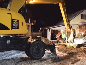 Photo by KEVIN McSHEFFREY/THE STANDARD
In the wee hours of Sunday morning, a city crew spent most of the night working on a broken waterline on Central Avenue in Elliot Lake. The crew spent more than six hours at the site.