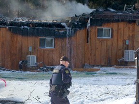 Remnants of the Forest Motel on the outskirts of Stratford continued to smoulder Wednesday as the Perth County Ontario Provincial Police remained at the site of Tuesday’s fire. (Cory Smith/The Beacon Herald)