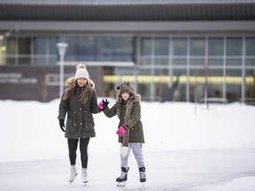 Isabel Alvarado and Emma Vivian, 8, enjoy an afternoon skate on the oval at the Montrose Cultural Centre Tuesday. The skating was part of a phys ed assignment to get out and exercise while doing school online this week, While  the Montrose Cultural Centre  is closed the library is offering curb-side and online services. RANDY VANDERVEEN
2021-01-05