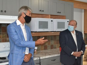 Bluewater Health president and CEO Mike Lapaine is pictured in September with Associate Minister of Mental Health and Addictions Michael Tibollo at a residence soon to be home to 12 withdrawal management beds. Tibollo Tuesday announced $325,000 to fund the new beds until the end of March. (Submitted)
