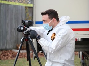 Sarnia police investigate a homicide scene on Lee Court where a woman died Thursday. Police said a male suspect was in custody.
Paul Morden/The Observer