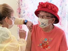 Valerie Verberg receives the Moderna COVID-19 vaccine in Sarnia-Lambton Tuesday. The Trillium Villa long-term care home resident is the first person in Sarnia-Lambton to receive the vaccine. (Submitted)