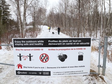 A sign posted at Fielding Memorial Park in Greater Sudbury, Ont. on Wednesday January 6, 2021, reminds visitors to follow COVID-19 protocols when visiting the park. John Lappa/Sudbury Star/Postmedia Network