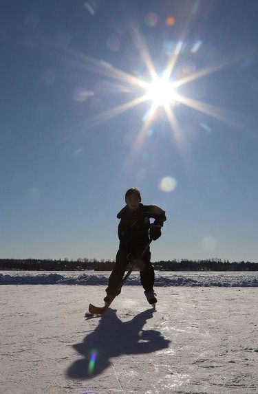 Martin Finn, 11, skates on a cleared section of ice on Ramsey Lake in Sudbury, Ont. on Thursday January 7, 2021. John Lappa/Sudbury Star/Postmedia Network