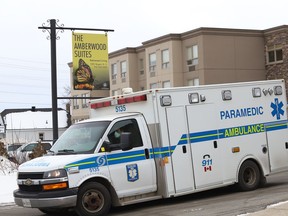 An ambulance leaves Amberwood Suites retirement home on Regent Street on Monday.