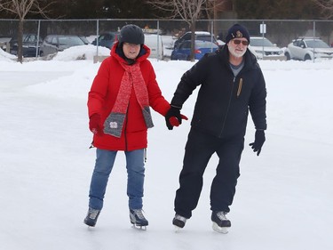 Cathy and Phil O'Neil skate at the Queen's Athletic Field skating oval in Sudbury, Ont. on Tuesday January 12, 2021. John Lappa/Sudbury Star/Postmedia Network