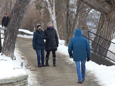 People go for a stroll through Bell Park in Sudbury, Ont. on Wednesday January 13, 2021. Thursday will be cloudy with a high of 0 degrees C. John Lappa/Sudbury Star/Postmedia Network