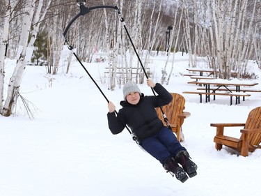 Irene Zhu enjoys a zip line ride at Kivi Park in Sudbury, Ont. on Thursday January 14, 2021. John Lappa/Sudbury Star/Postmedia Network