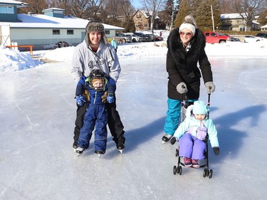 Jonathan and Jennifer Dallaire take their children, Jack, 3, and Kaylee, 2, for a skate on the Ramsey Lake skating path in Sudbury, Ont. on Monday January 25, 2021.