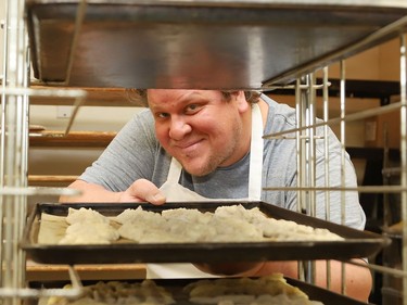 Head baker Aaron Laakso, of Leinala's Bakery in Sudbury, Ont., makes karjalan piirakka (rice pies) on Tuesday January 26, 2021. The local business is celebrating 60 years in February. The business was established in 1961 on Antwerp Street by Laakso's grandparents, Elli and Arvi Leinala. Most everything made at the bakery features ingredients from Elli Leinala's recipes which have no preservatives. The bakery is owned by Aaron's parents, Mark and Marjaana Laakso. John Lappa/Sudbury Star/Postmedia Network