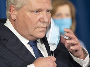 Ontario Premier Doug Ford prepares to speak at Queen's Park in Toronto on Tuesday, Jan. 12 to announce a state of emergency and stay at home order for the province of Ontario.

THE CANADIAN PRESS/Frank Gunn