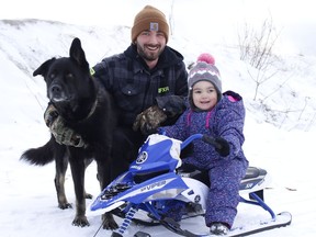 Jonah Lacasse, his daughter Sophia and their dog Dallas were getting some fresh air and exercise at the sliding hill east of Ross Avenue in Timmins on Thursday.

RICHA BHOSALE/The Daily Press