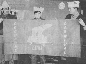 Flying start – Cochrane's own Snow Carnival flag, an addition to the ninth annual carnival, will fly over Lake Commando during carnival time. The Chimo theme for the flag was the idea of Guy Belisle (left), president of the Board of Trade. Roy Mitchell (right) carnival chairman, was its designer and Claude Labelle was main production man.