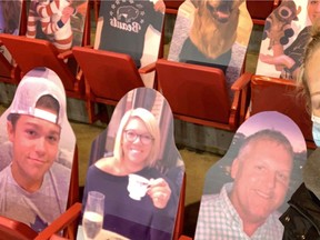 With her biggest fans unable to be there in person due to COVID-19,  brother Luken (left), mom Tara and dad Aron were with Mitchell's Neve Van Pelt in spirit as she started her professional hockey career with the Buffalo Beauts of the NWHL in the "bubble" in Lake Placid, New York. SUBMITTED