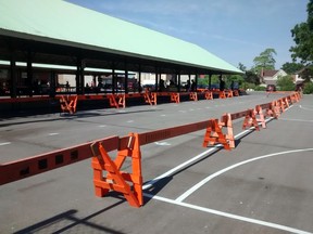 Barriers for COVID-19 crowd control defined Horton Farmer's Market through the 2020 season after the pandemic almost shuttered the historic venue. The St. Thomas Economic Development Corporation now is to take over operation.Eric Bunnell